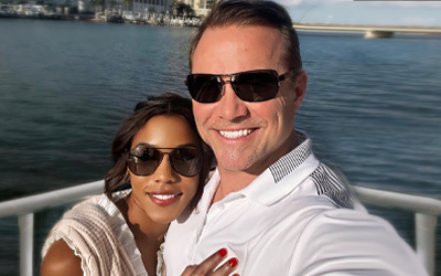 happy latin woman with western man